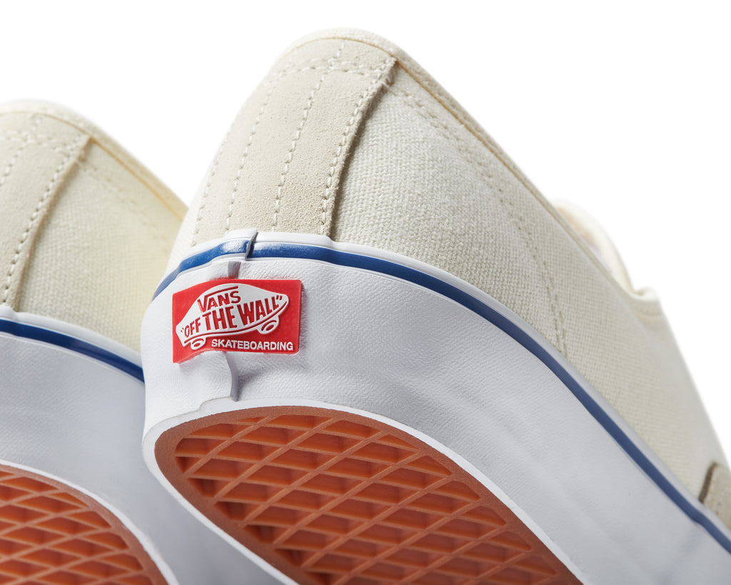White vans with red and discount blue stripe